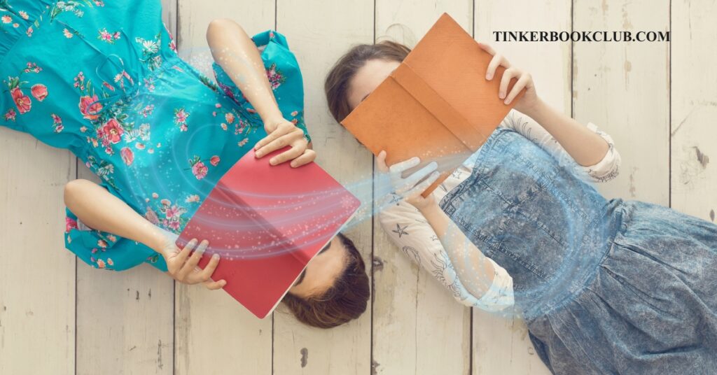 Two young girls lie on the floor next to each other reading books together. Classic books about friendship for kids.