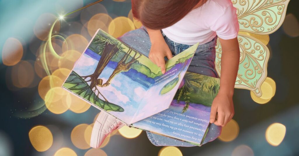 A girl wearing fairy wings sits on the floor reading a fairy tale picture book. Fairy Tale Book Club for homeschool.