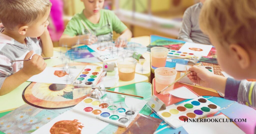 Kids doing water color painting after a read aloud. Kids book club.